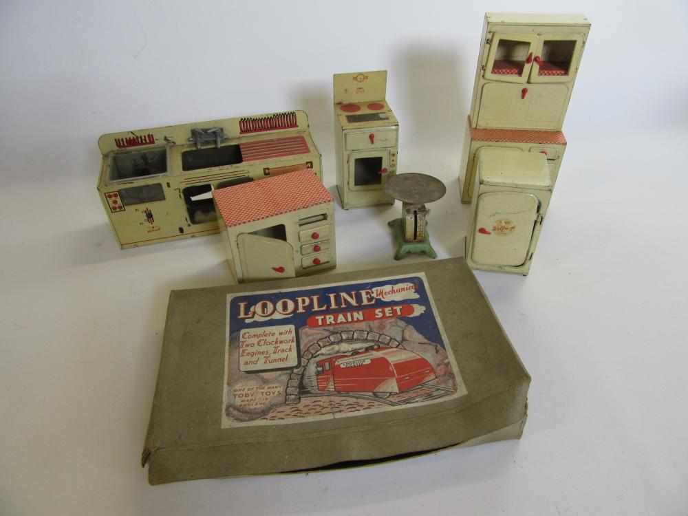 A "Welcook" six piece tinplate kitchen set Image