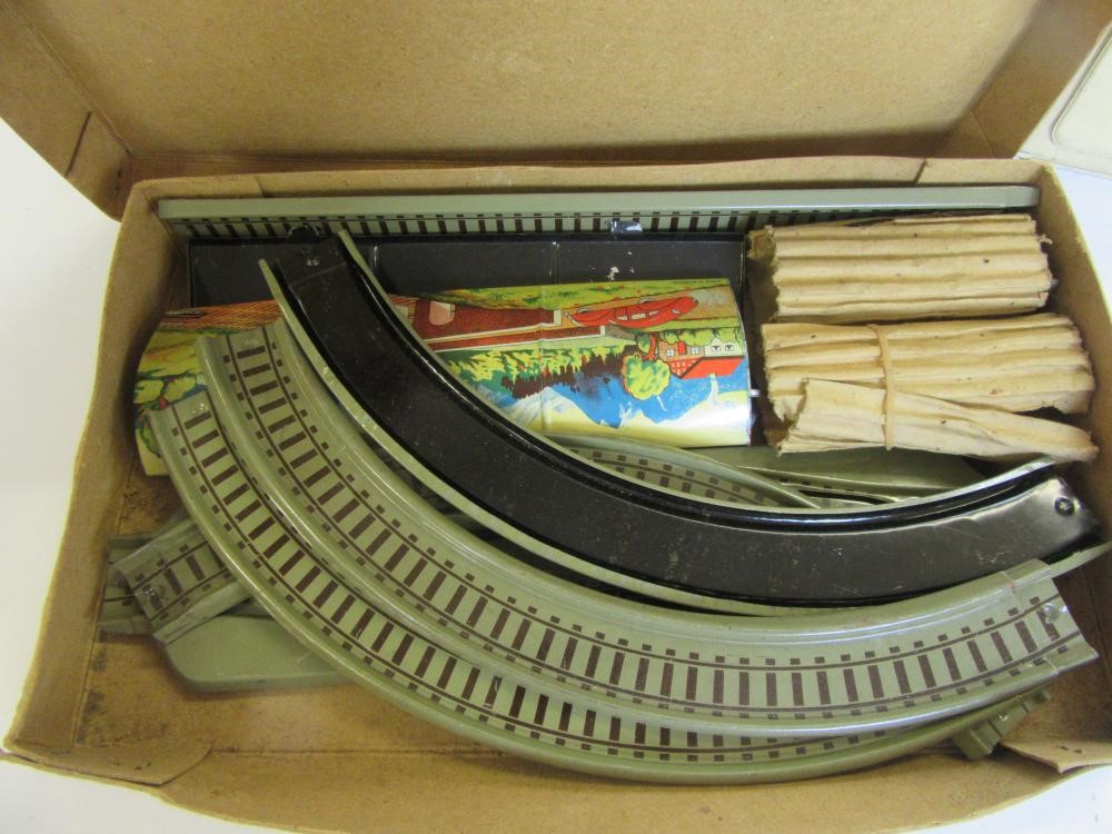 A "Welcook" six piece tinplate kitchen set Image