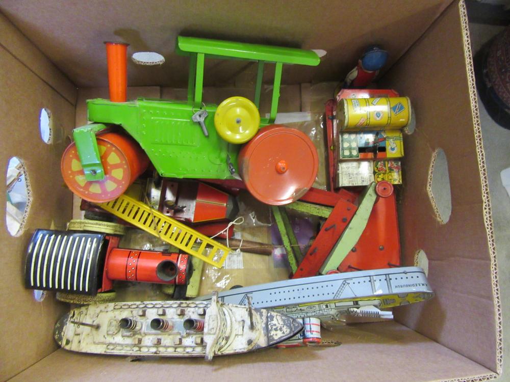 A Mettoy clockwork steam roller with novelty motion Image