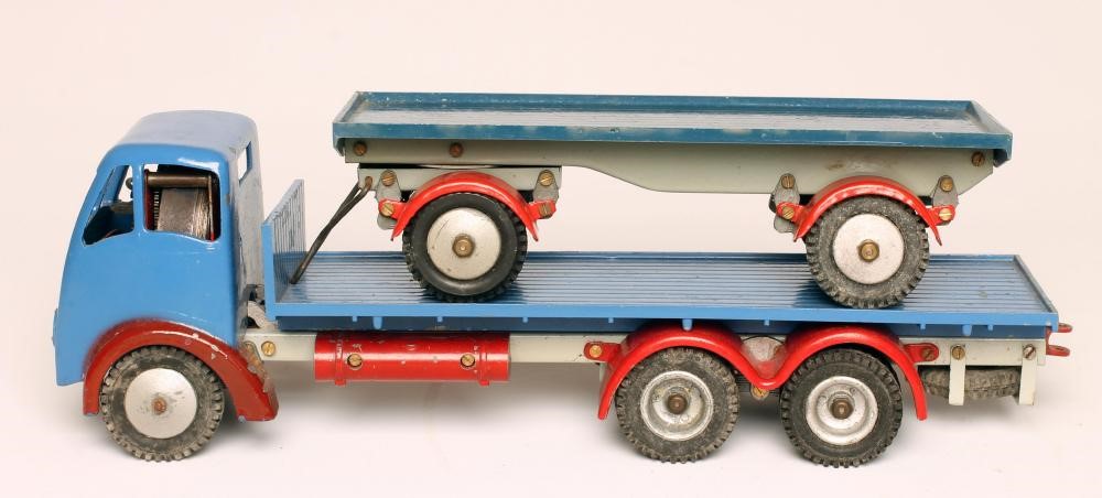 A Shackletons Foden FG six wheel platform lorry in blue with red winds and grey chassis Image