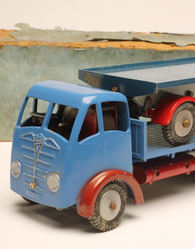A Shackletons Foden FG six wheel platform lorry in blue with red winds and grey chassis Image