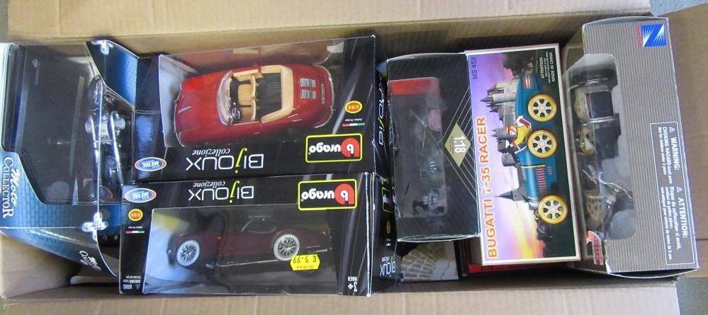 Eighteen diecast vehicles of various scales by Burago Image