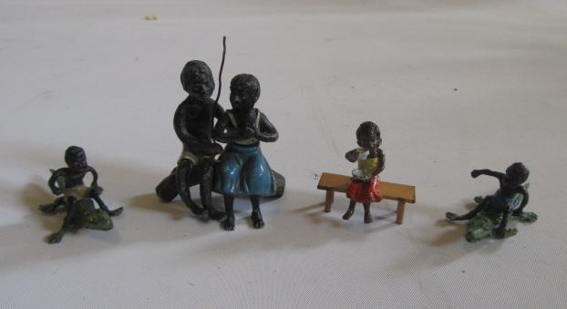 Four Austrian painted metal groups of blackamoors Image