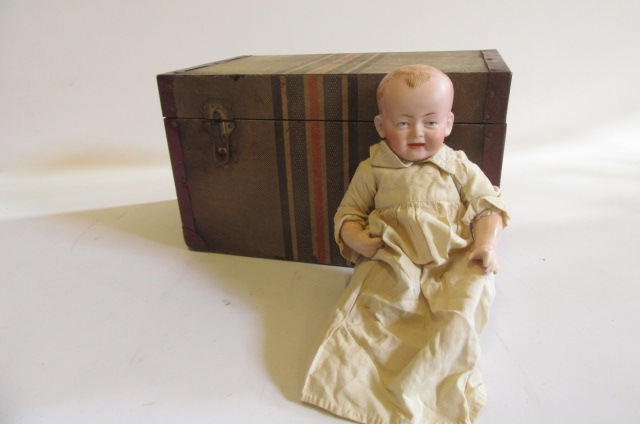 A Kley & Hahn bisque head boy character doll with painted face Image