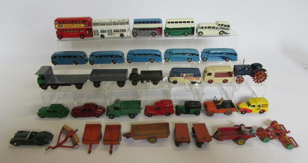 Twenty six Dinky bus and other vehicles and five Corgi vehicles Image