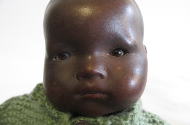 An armand marseille bisque head brown dream baby doll with painted Hartleys Auctioneers Valuers