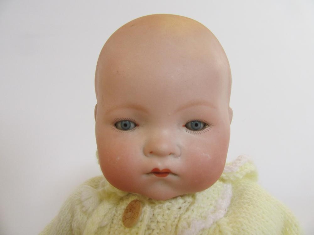 An Armand Marseille bisque head baby doll Image