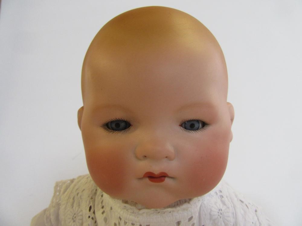 An Armand Marseille bisque head baby doll Image