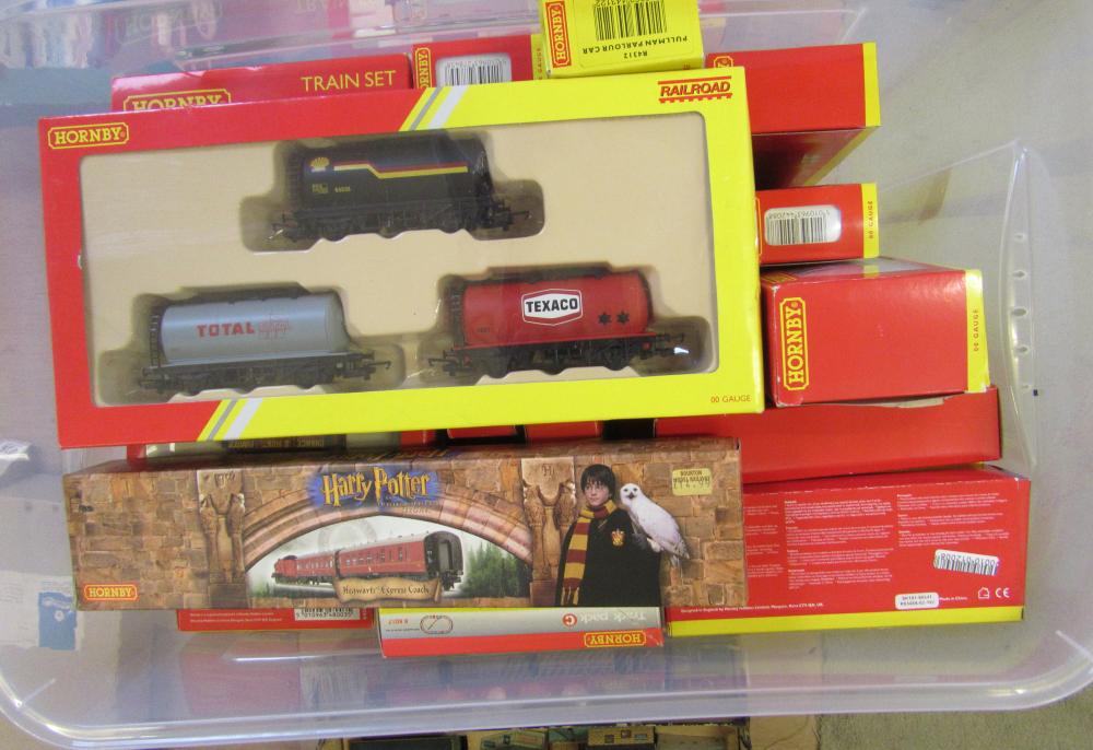Hornby rolling stock and trackside accessories including coal trucks Image
