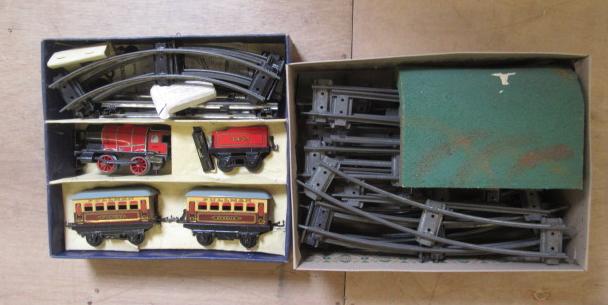 Hornby M1 Passenger Train Set with red 0-4-0 locomotive and two coaches and a quantity of track with Image