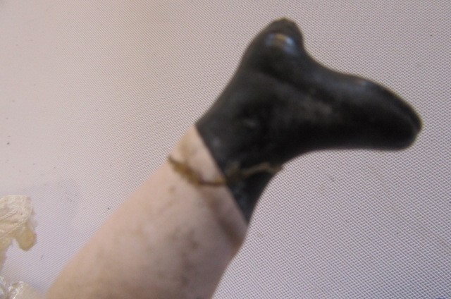 An Armand Marseille bisque head and shoulders doll Image