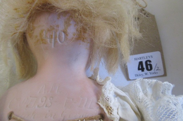 An Armand Marseille bisque head and shoulders doll Image