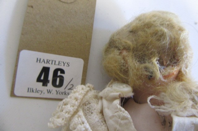 An Armand Marseille bisque head and shoulders doll Image