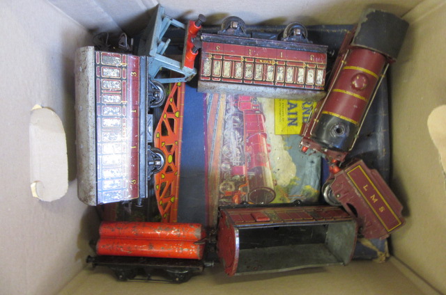 Playworn trains by Hornby including clockwork 0-4-0 locomotive and track Image