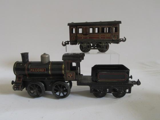 Bing G1 clockwork 0-4-0 locomotive and tender finished in green with Record to boiler Image