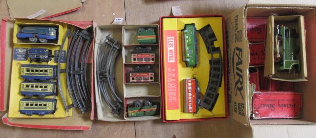 Three clockwork train sets by Brimtoy and Mettoy including diesel passenger set Image