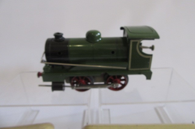 Three clockwork train sets by Brimtoy and Mettoy including diesel passenger set Image