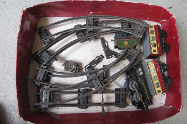 A Hornby 0-4-0 clockwork locomotive and tender Image