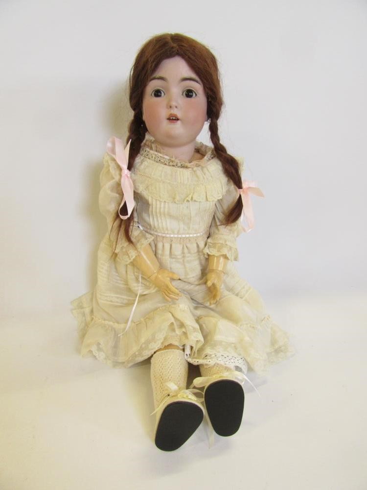 A J D Kestner bisque head doll with brown glass sleeping eyes Image