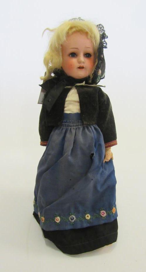 A Seyfarth and Reinhardt bisque head doll with brown glass sleeping eyes Image