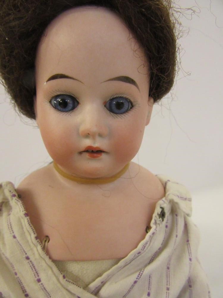 A Cuno & Otto Dressel bisque shoulder head doll Image