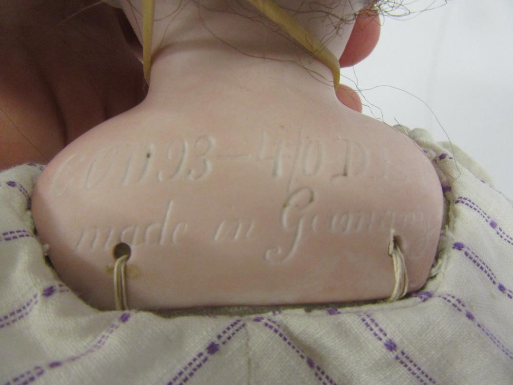 A Cuno & Otto Dressel bisque shoulder head doll Image