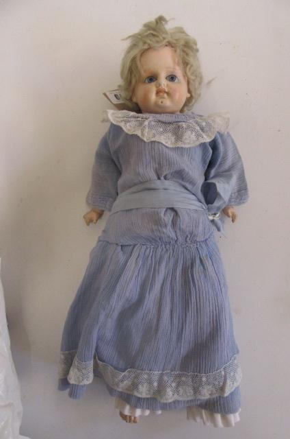 A 19th century composition shoulder head doll Image