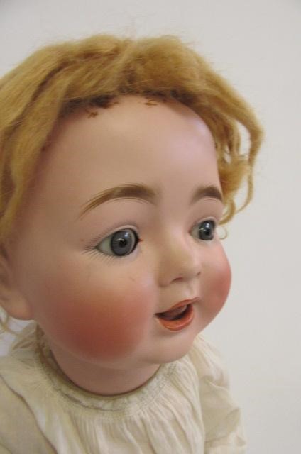 A Caterfelder Puppenfabrik bisque head character doll with blue glass sleeping eyes Image