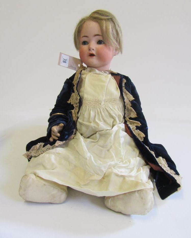 An Ernst Heubach bisque head character doll with blue glass sleeping eyes Image
