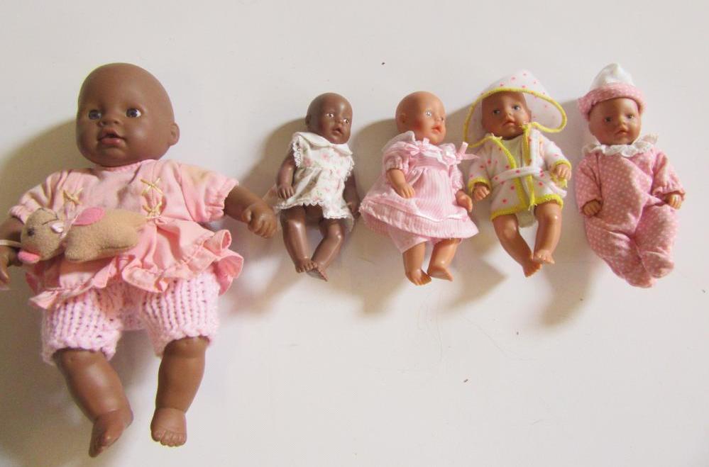 A collection of five Zapf rubber baby dolls comprising 7 1/2" doll with fixed glass eyes Image