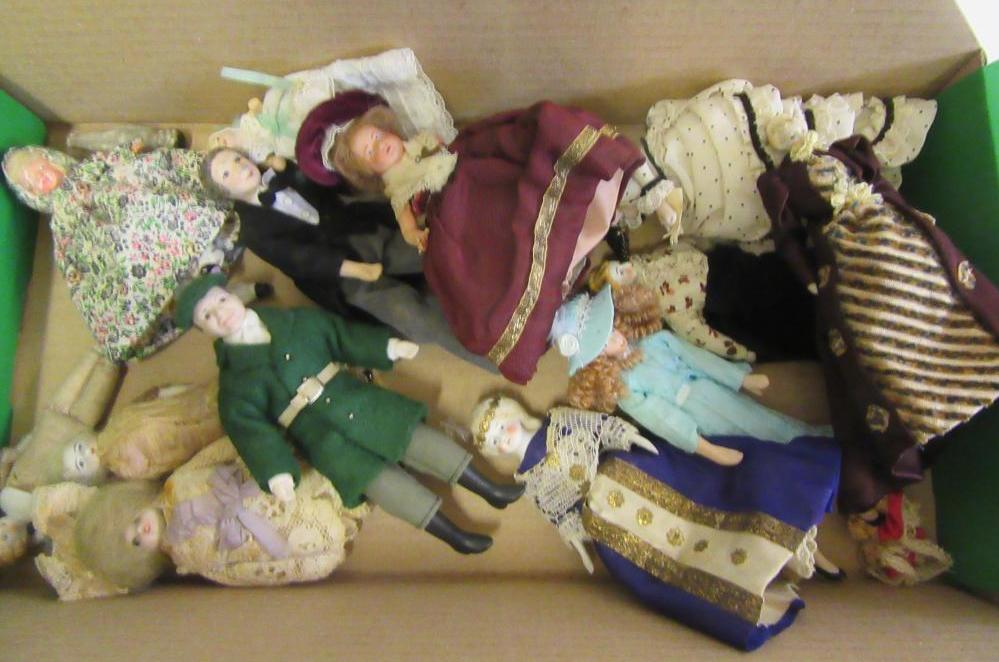 A collection of fourteen mainly older dolls house dolls Image