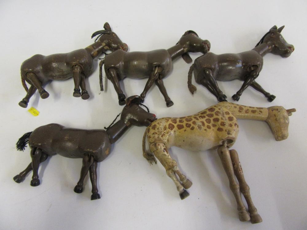 A collection of fourteen mainly older dolls house dolls Image