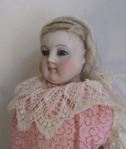 An early bisque shoulder head doll Image
