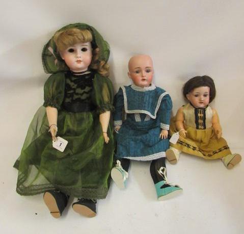 Three bisque socket head dolls Image
