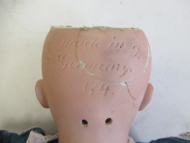 Three bisque socket head dolls Image