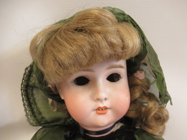 Three bisque socket head dolls Image
