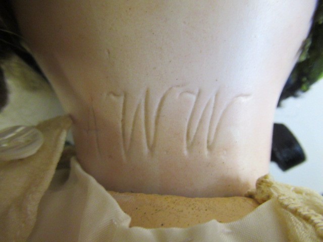 Three bisque socket head dolls Image