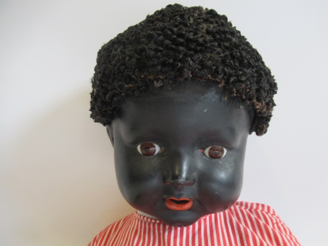 Four compositon head dolls Image