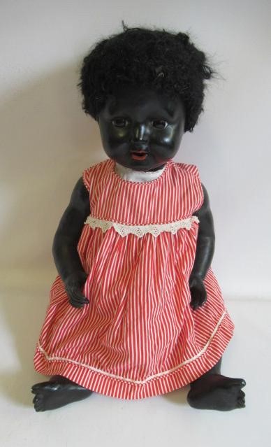 Four compositon head dolls Image