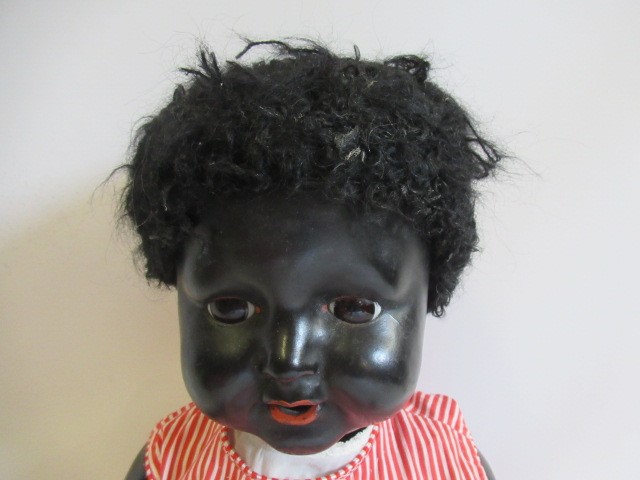 Four compositon head dolls Image