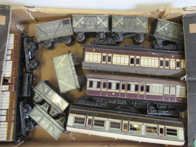 Playworn L.N.W.R. rolling stock by Bing, some over painting and rusting (Est. plus 24% premium inc. Image
