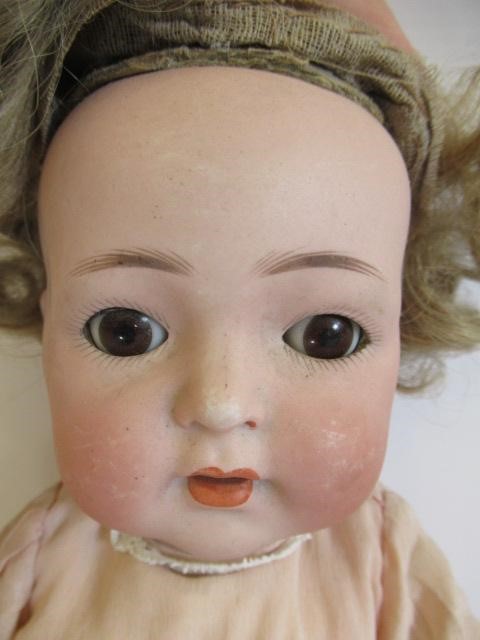 Three German bisque head dolls Image