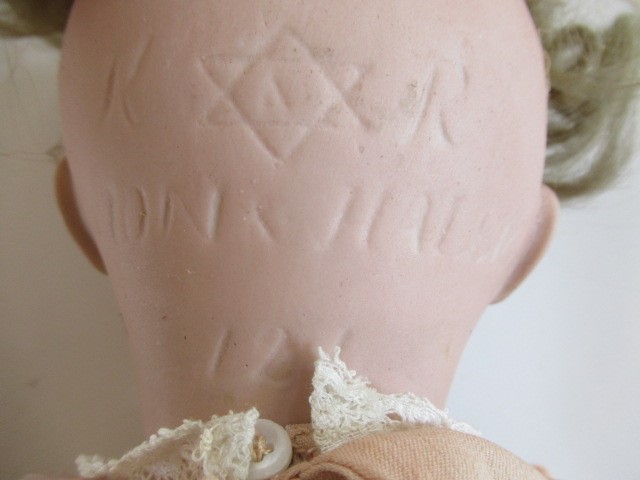 Three German bisque head dolls Image