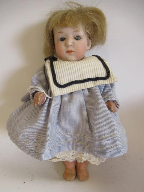 Three German bisque head dolls Image