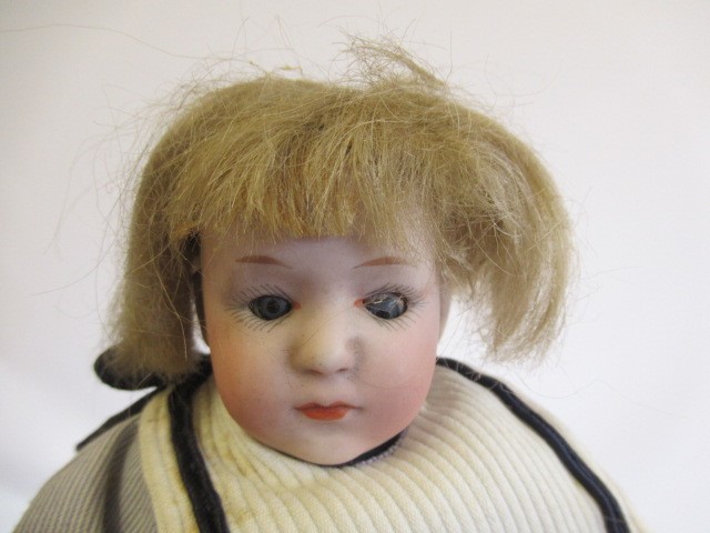 Three German bisque head dolls Image