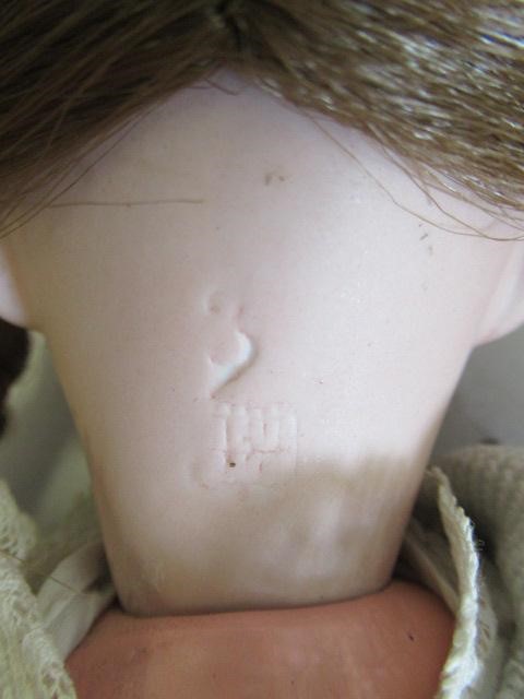 Two Heubach bisque socket head 10537 dolls, comprising one 11 1/2" doll and one 10 1/2", both with Image