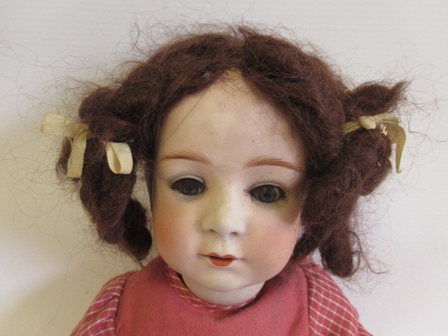 Three restored bisque socket head dolls Image