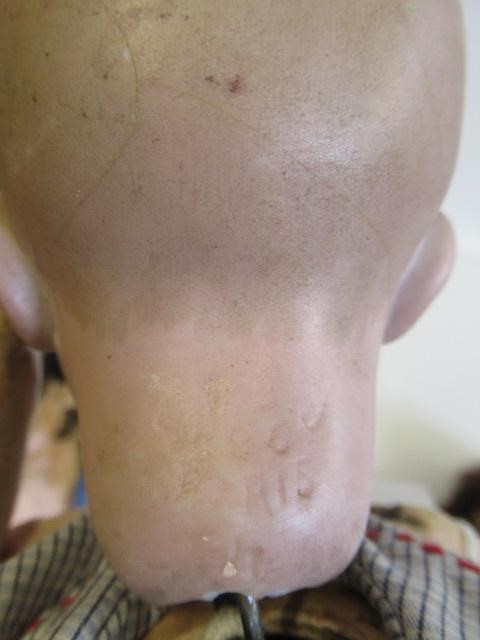 Three restored bisque socket head dolls Image