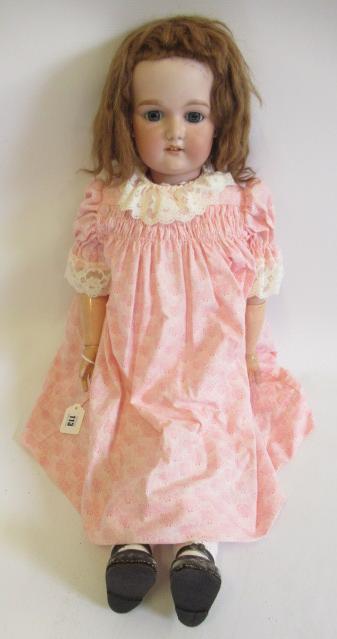 A large Armand Marseille bisque socket head doll Image