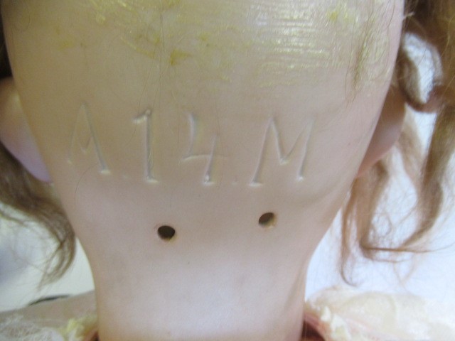 A large Armand Marseille bisque socket head doll Image